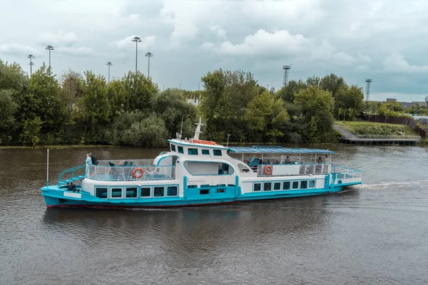 light-engine boat float floating on the river .