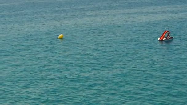 Group of young people ride catamaran in sea at summer sunny day — Stock Video