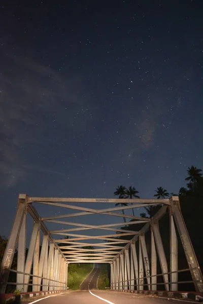 the night atmosphere looks the stars just above the iron bridge,Tidore INDONESIA