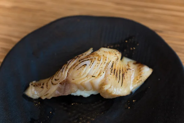 Ein Stück Gindara Sushi — Stockfoto