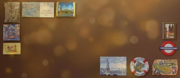 Seyahat mıknatısları çerçevelenmiş. Altın bokeh