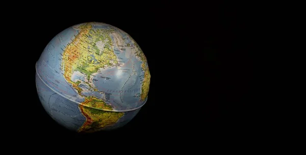 Colored planet earth in black space.