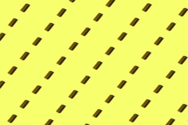 Tasarım ve afiş için arka plan. Sarı arka planda bir çocuk tasarımcısından sarı bir element. Desen