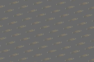 Tasarım ve afiş için arka plan. Gri arka planda bir ataç. Desen