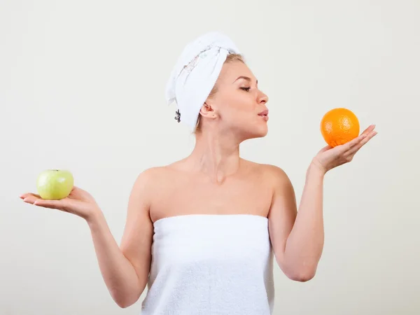 Young beautiful woman wrapped in towel isolated — Stock Photo, Image