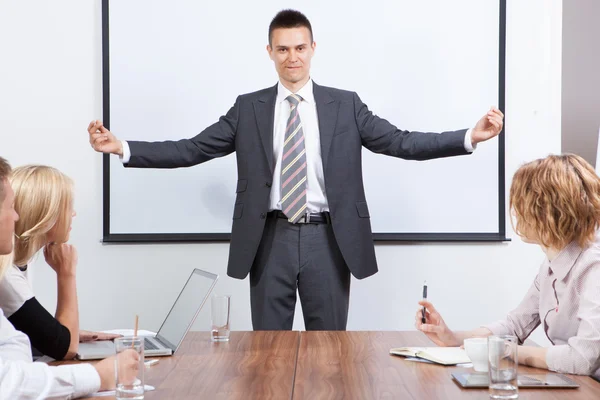 Business team motivated by positive presenter — Stock Photo, Image