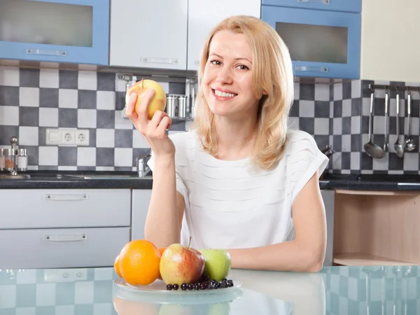 Woman holding  fresh fruits in hands — Stock Photo, Image