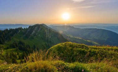 panoramic mountain landscape at sunset on the ridge of the Nagelfluh mountains chain chain near Oberstaufen, Allgaeu area, Bavaria, Germany, 