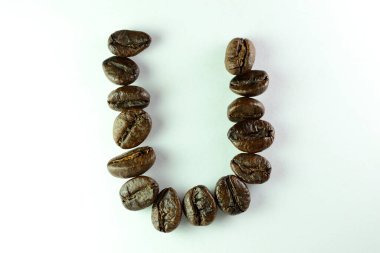 Kahve çekirdekli U harfi