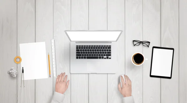 Interior architect work on laptop with isolated display for mock up. Paper, divider, wrinkled paper, glasses, ruler on desk. — Stock Photo, Image