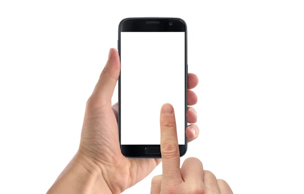 Мужская рука трогает дисплей черного изолированного смартфона. Белый экран для макета . — стоковое фото