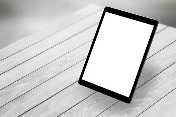 Tablet with white isolated screen on wooden desk. Isometric view — Stock Photo, Image