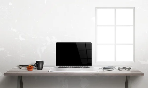 Laptop na mesa do escritório. Óculos, almofada, café, mufin, livro sobre mesa — Fotografia de Stock