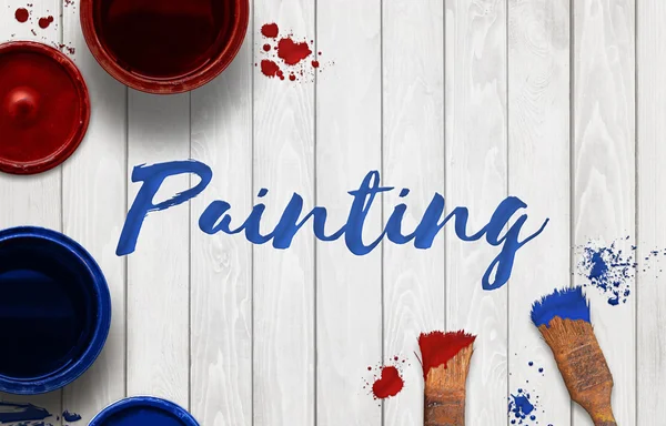 Word painting painted on a wooden background with brushes. Box and