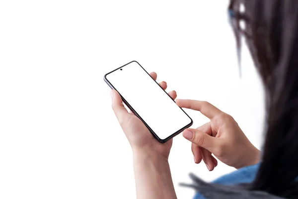 Woman holding smart phone and touch display with right hand concept. View over the shoulder. Isolated screen and background for mockup