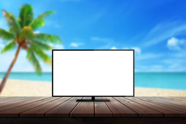 Tv aislada en el escritorio con la playa de la palma del mar fondo de verano para la presentación simulada — Foto de Stock