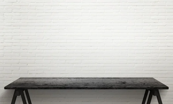 Tavolo vuoto, spazio di lavoro con muro in mattoni sullo sfondo . — Foto Stock
