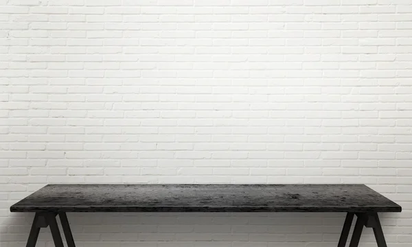 Empty table, workspace with brick wall in background. — Stock Photo, Image