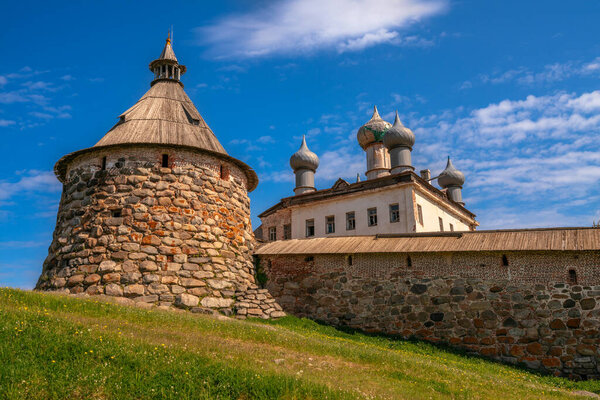 View of the Korozhnaya Tower, the icon painting chamber and the wall of the Spaso-Preobrazhensky Solovetsky Monastery against the cloudless sky, Solovetsky Island, Arkhangelsk region, Russia