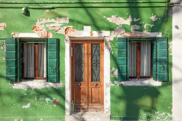 Detail of a traditional green house in Burano island, Venice