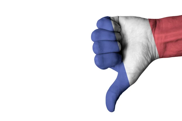 Frankrike flagga på mänsklig manlig tumme ner hand — Stockfoto