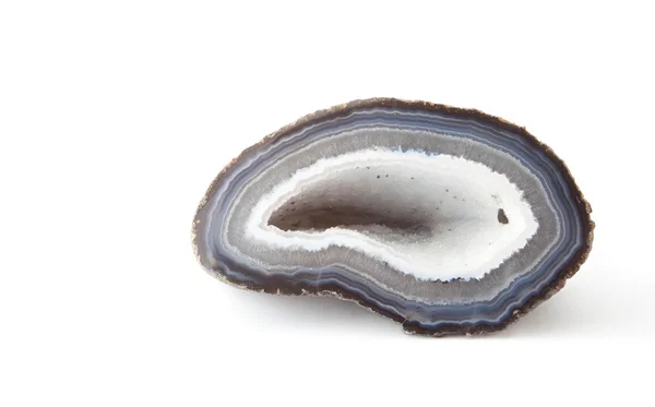 Secção de um geode branco e azul em fundo branco — Fotografia de Stock