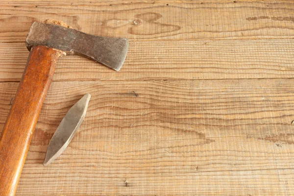 Dated and used cleaver on wooden background — Stock Photo, Image