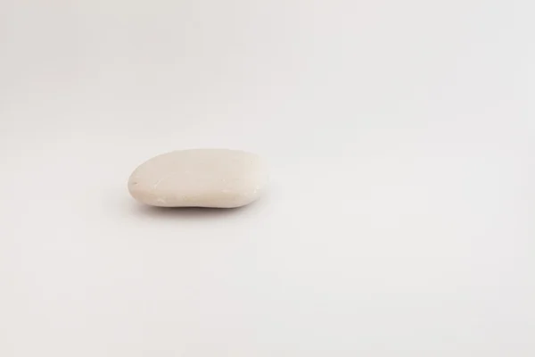 Pedra em fundo branco — Fotografia de Stock