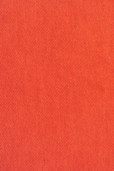 Červené džíny jako texturu — Stock fotografie