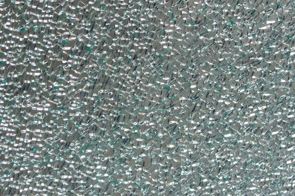 Vidro inquebrável danificado pela textura acidente — Fotografia de Stock
