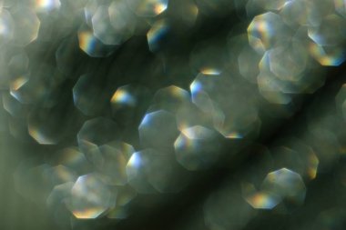 Yeşil bir rengin pırıl pırıl parıltısı. Güzel arkaplan.