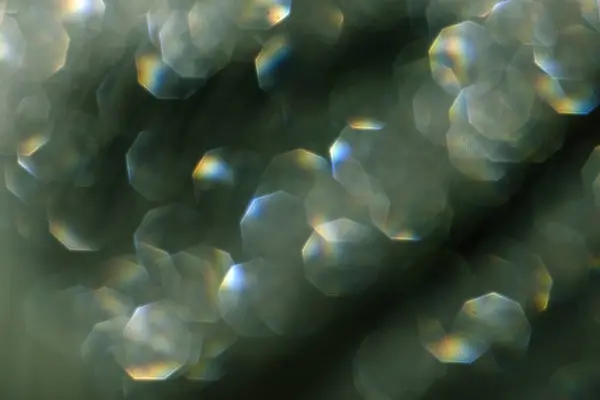Yeşil bir rengin pırıl pırıl parıltısı. Güzel arkaplan.