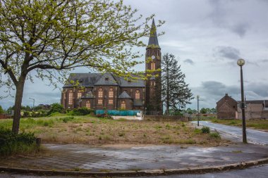 Empty streets and abandoned houses in the resettled village of Manheim - Alt for the Hambach opencast mine