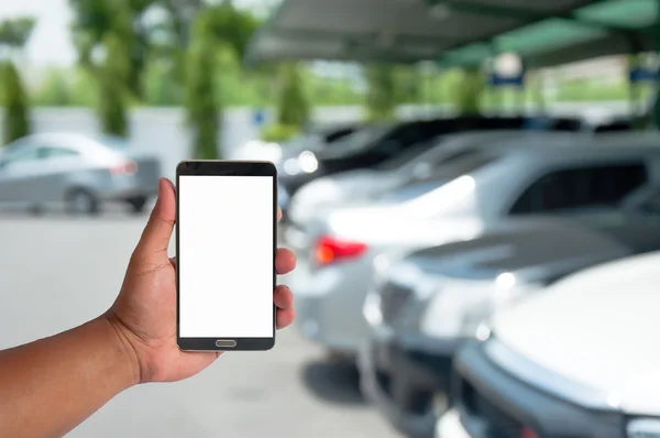 Adamın elini bulanık otopark ile cep telefonu idare 