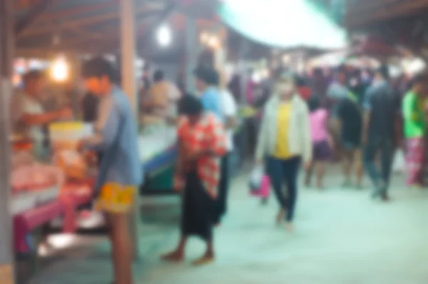 Blur hombre de compras en el mercado — Foto de Stock