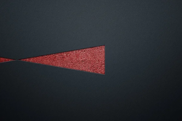 Červený trojúhelník v luxusní kovové stěny. — Stock fotografie