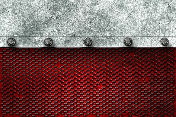 grunge metal background. metal plate on black grille and red pla