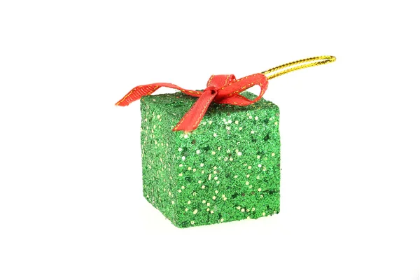 Green gift box and red ribbon Stock Image