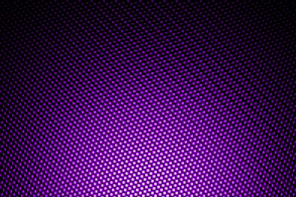 Projecteur sur fond de fibre de carbone violet . — Photo