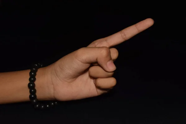 黒を背景に孤立したスチ ムドラの手 — ストック写真