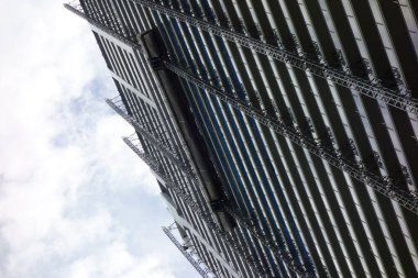    Innovative design of ultra-modern skyscraper, exterior pattern from directly below                            