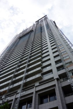    Innovative design of ultra-modern skyscraper, exterior pattern from directly below                            