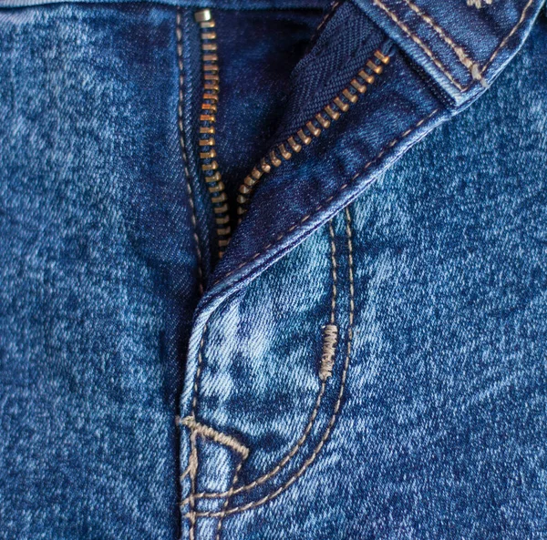 Pants open zip. Blue denim, texture. jeans. — Stock Photo, Image