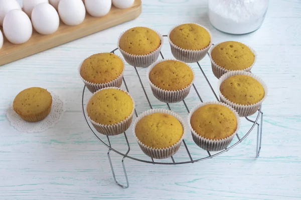 muffins are cooled on a pastry steel grate. Home baking concept.