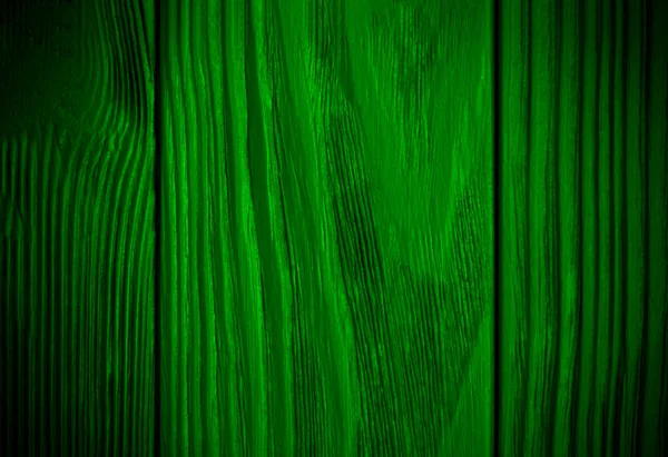 Ярко-зеленый фон текстуры дерева. Абстрактная темная текстура на зеленой стене — стоковое фото