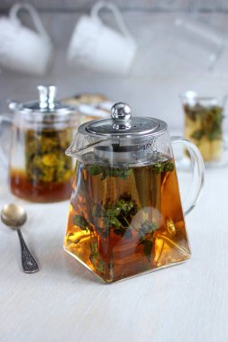 herbal tea with flowers and mint