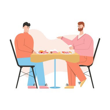 Gay çift restoranda romantik bir akşam yemeği yiyor.
