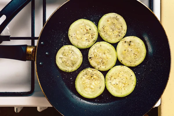Fried zucchini slices prepared on a pan — Stock Photo, Image