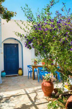 Entry to typical Greek house, blue doores , Greece clipart