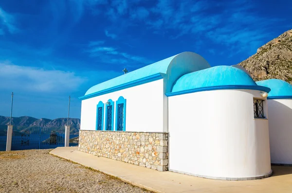 Church with iconic blue roof on Greek island — Stock Photo, Image